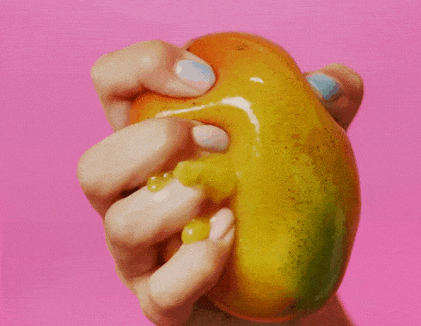mango squeezing