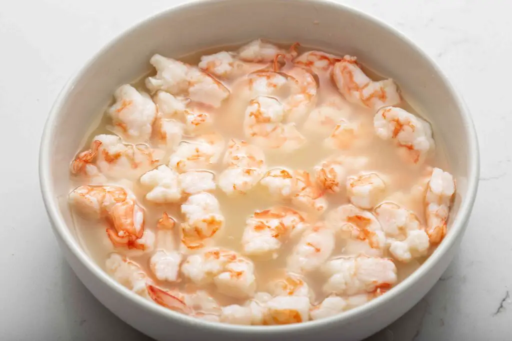 why does lemon juice cook shrimp